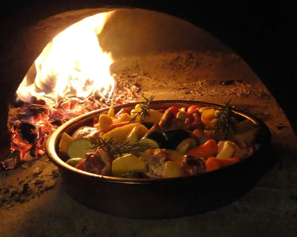 Traditional Dalmatian peka prepared over an open fire
