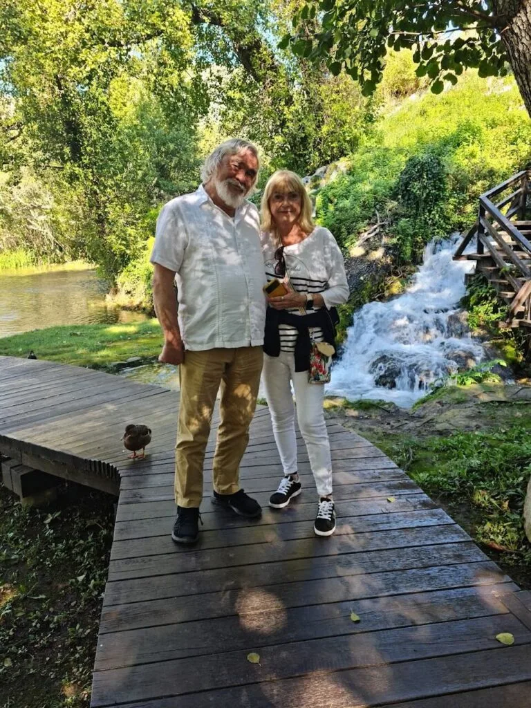 happy turists in roški slap
